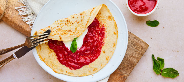 Pannenkoek met verse frambozensaus