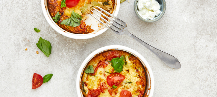 Mini quiche met geitenkaas, tomaatjes en courgette